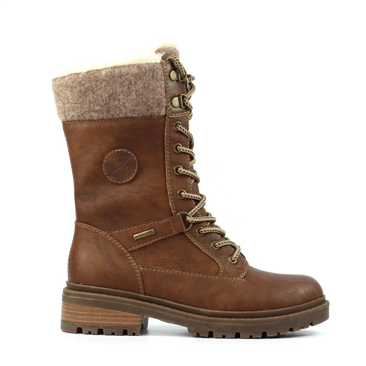 Cambridge tan waterproof calf boots styled for a winter coastal walk