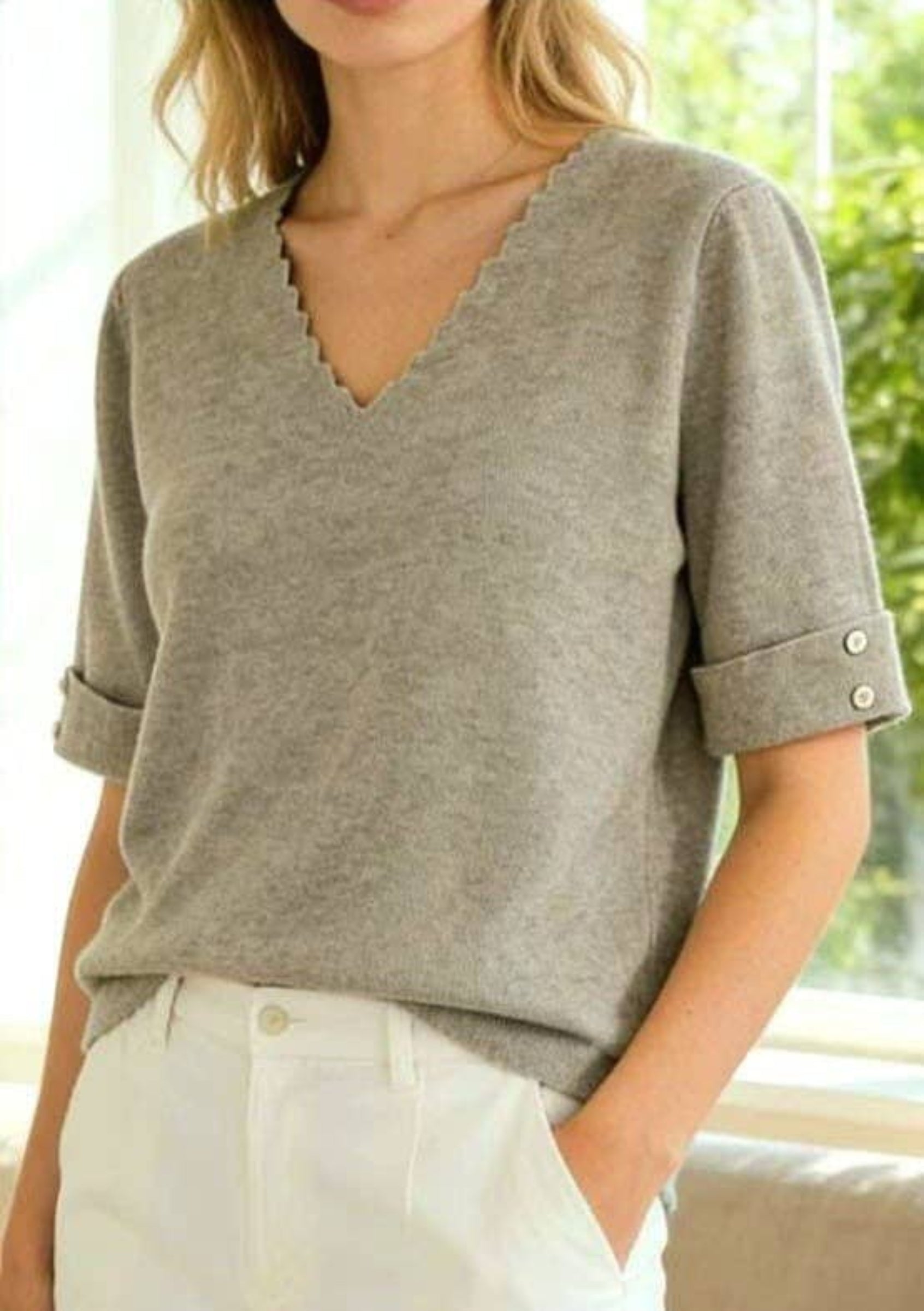 Kurt Muller scallop V-neck fine-knit top showing turn-up button sleeve detail