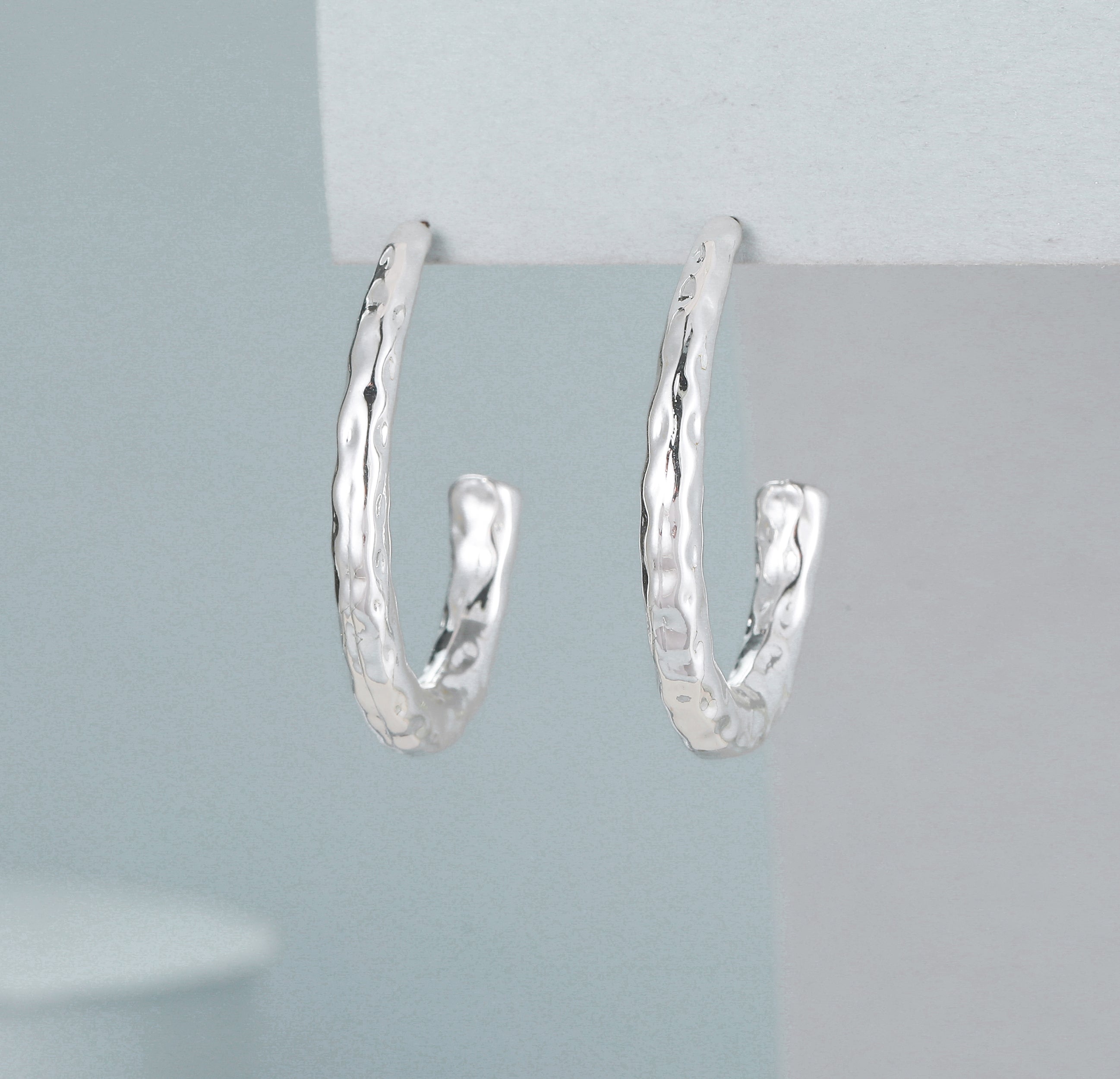 Elide Huggie Hoop Hammered Metal Earrings